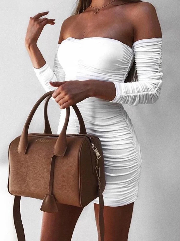 Vestido Ceñido de Hombros Descubiertos – Elegancia y Estilo Atemporal