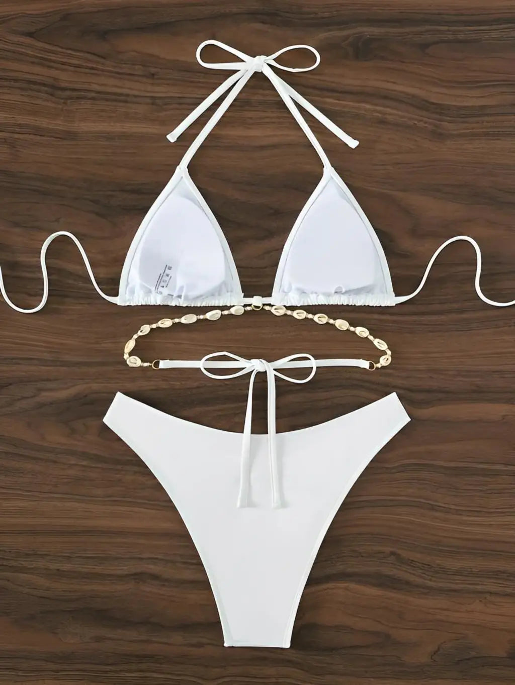 Bikini triangular con conchas – Traje de baño con top decorado y braguita ajustable